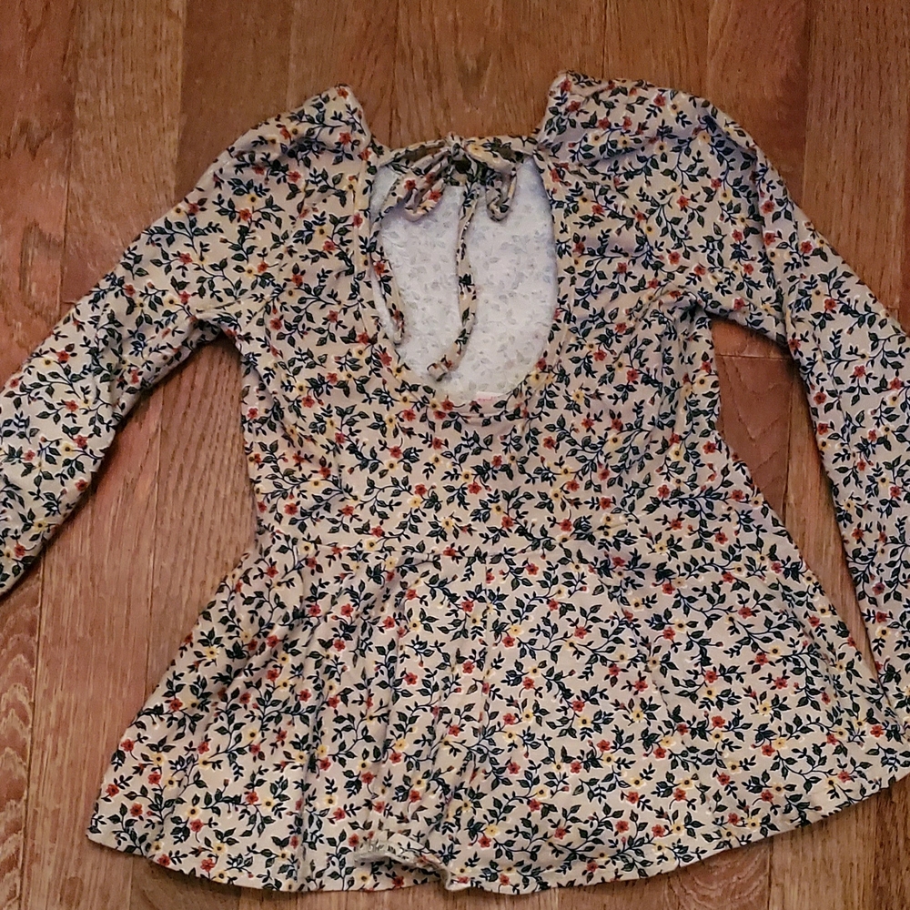 Ric Rac and Ruffles Peplum Top
Size 7 - Picture 2 of 2